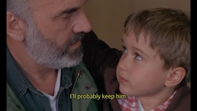 An elderly man looks at a young boy, saying "I'll probably keep him.'"